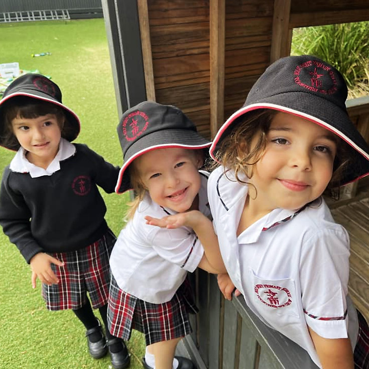 Girls in cubbyhouse at Holy Spirit Catholic Primary St Clair