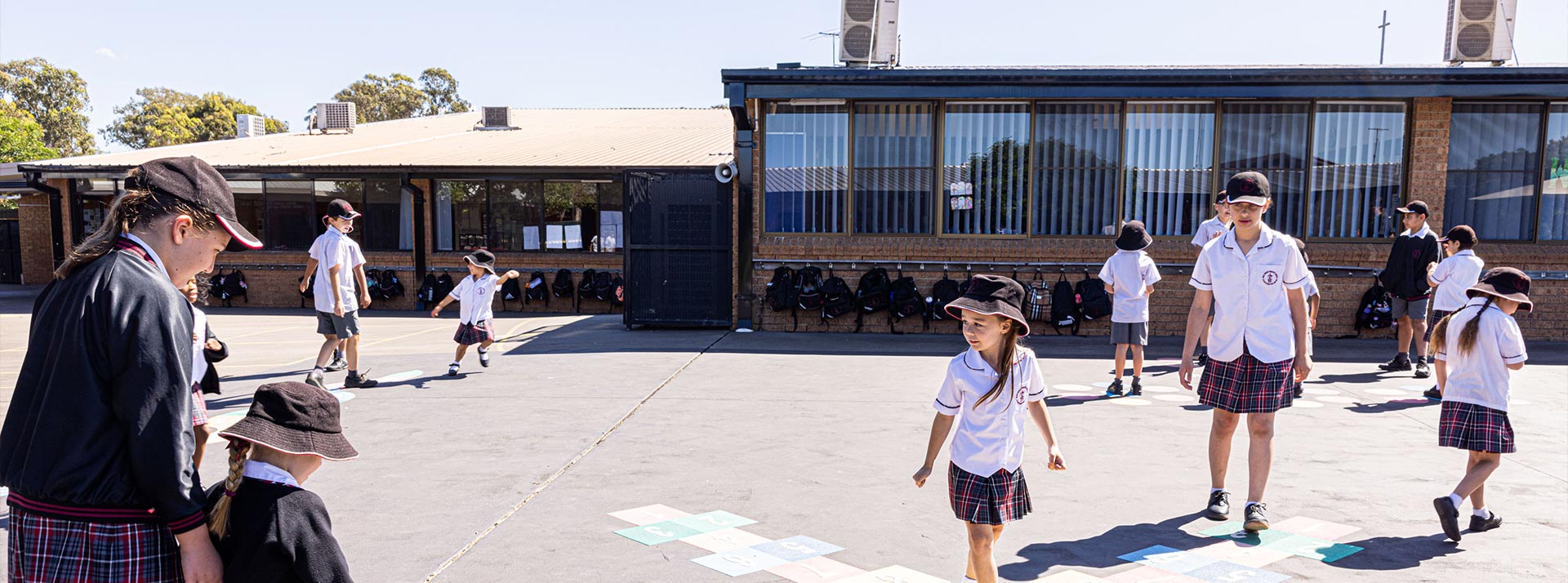 Holy Spirit Primary St Clair students playing hopscotch